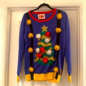 Woman’s ugly Xmas sweater